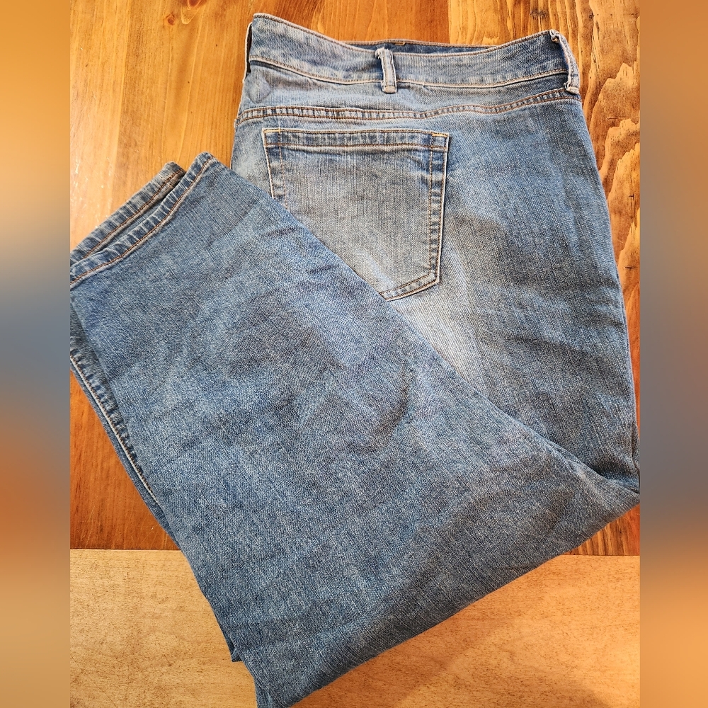 Torrid Womens Jeans Size 26.  Faded blue with more stonewash on front.